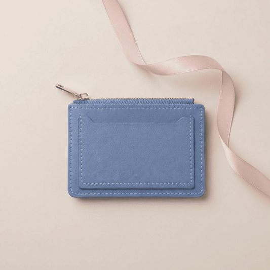 Portefeuille femme compact moraillon zip cuir synthétique bleu ciel Lunara avec ruban rose poudré — Novaleor