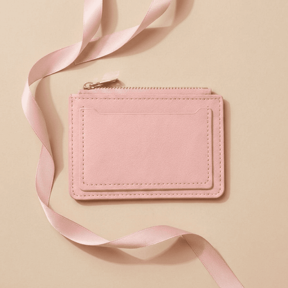 Portefeuille femme compact moraillon zip cuir synthétique rose Lunara avec ruban rose poudré — Novaleor