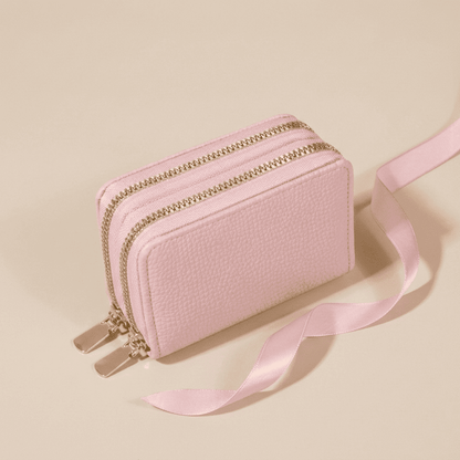 Portefeuille femme compact zippé grande capacité en cuir synthétique rose Serenya avec ruban rose poudré — Novaleor