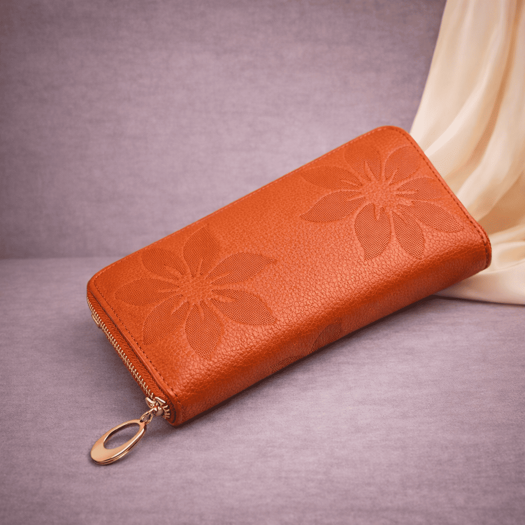 Portefeuille femme orange en cuir texturé à motifs floraux avec fermeture éclair | Novaleor