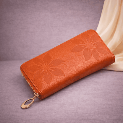 Portefeuille femme orange en cuir texturé à motifs floraux avec fermeture éclair | Novaleor